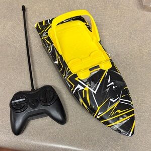 Yellow and Black Remote Control Boat